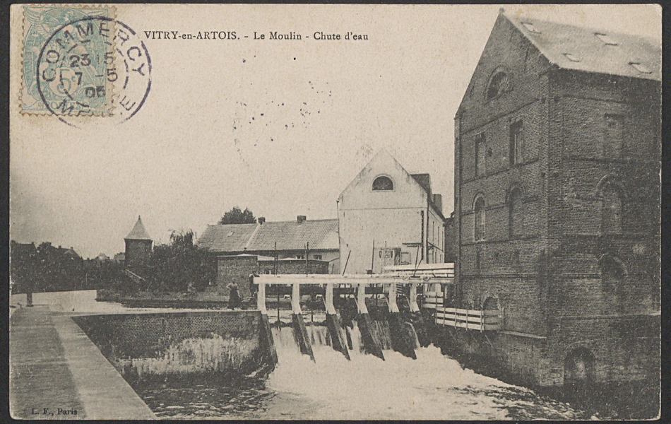 Carte postale noir et blanc représentant un moulin. 